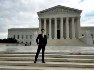 Simon Tam on steps of the Supreme Court
