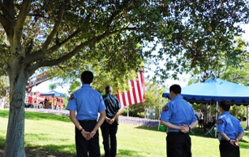 Firefighters observing ceremony